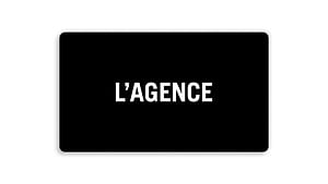 A sleek black rectangle with rounded corners centers the bold, white uppercase 