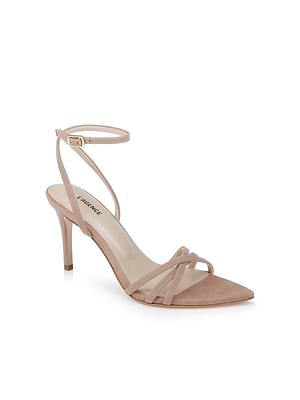 The Dua Suede Sandal features tan suede, a stiletto heel, thin straps, pointed toe, and an ankle strap with a small buckle. The insole shows the LAGENCE label. Displayed on a plain white background.