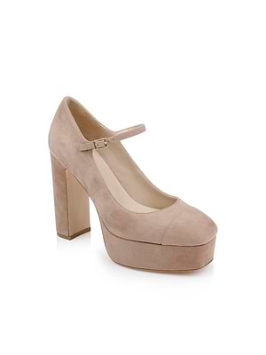The Lilles Platform Pump is a beige cappuccino suede Mary Jane with a rounded toe, thick high heel, and slim buckle strap across the instep, shown on a white background.